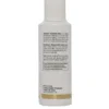 A bottle of lotion with a white label.