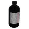A bottle of liquid with a label on it.